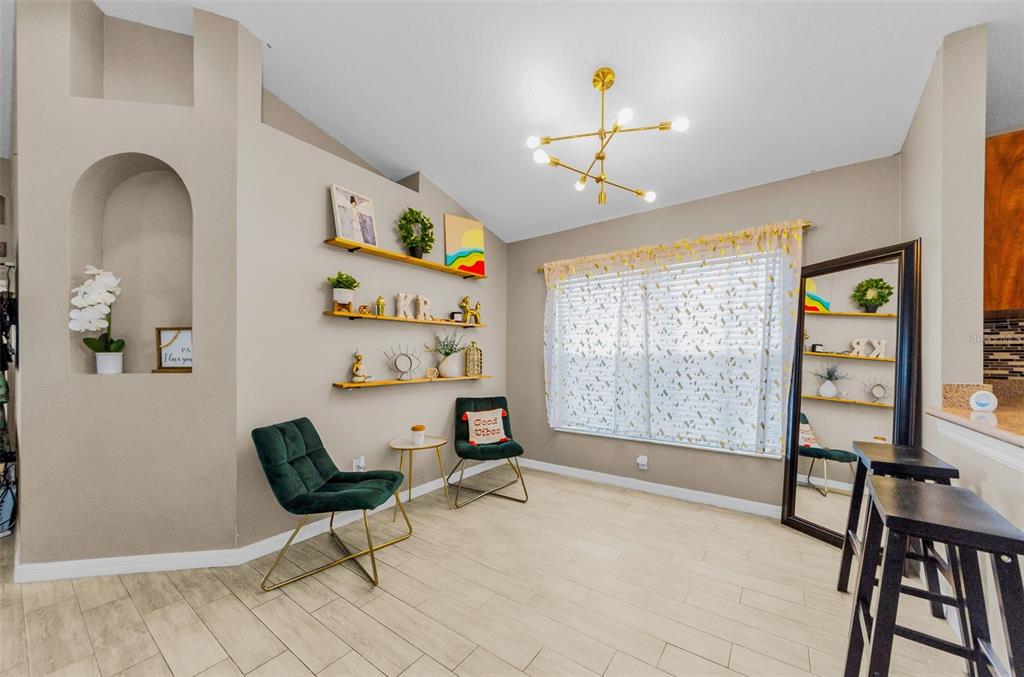 13561 Fladgate Mark Drive Riverview, FL 33579 - Photo 9 of 65 a view of a livingroom with furniture and a window