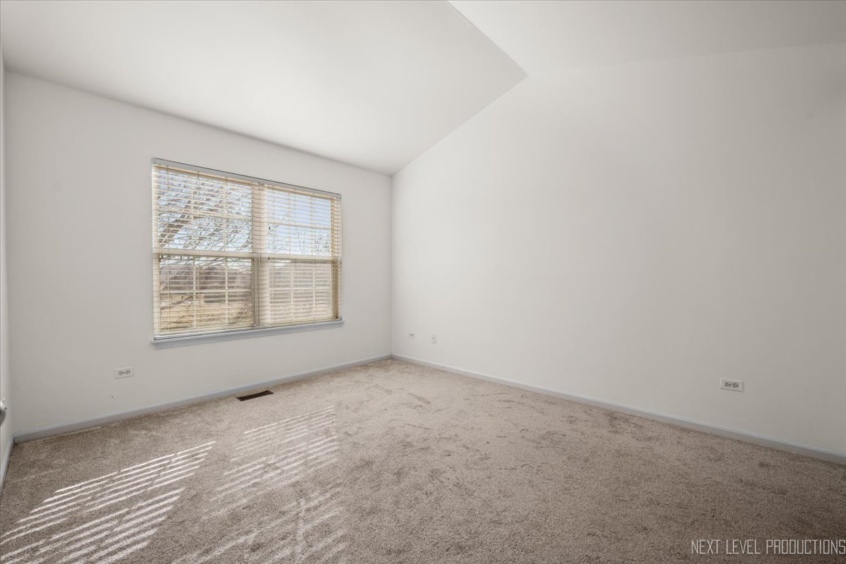 2819 White Thorn Circle Naperville, IL 60564 - Photo 14 of 23 an empty room with windows
