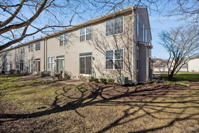 a view of a house with snow on the floor