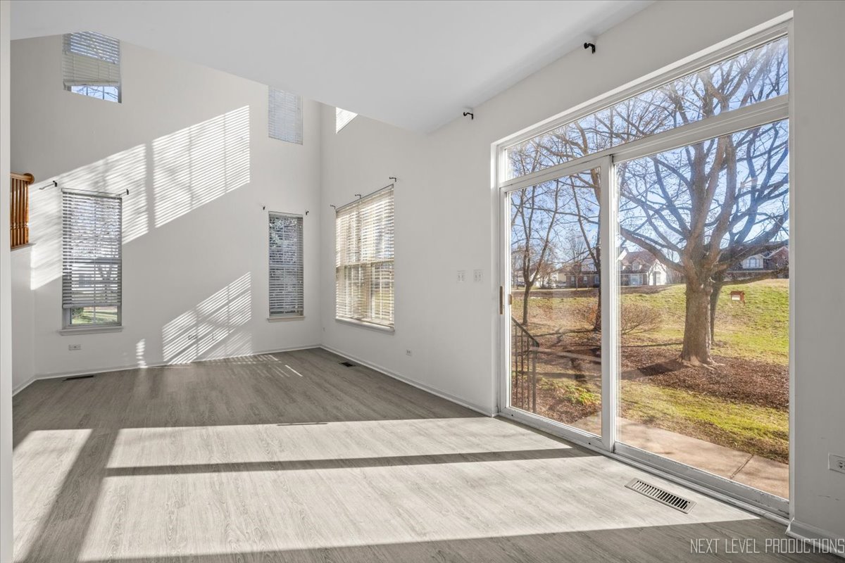2819 White Thorn Circle Naperville, IL 60564 - Photo 7 of 23 a view of an entryway with wooden floor