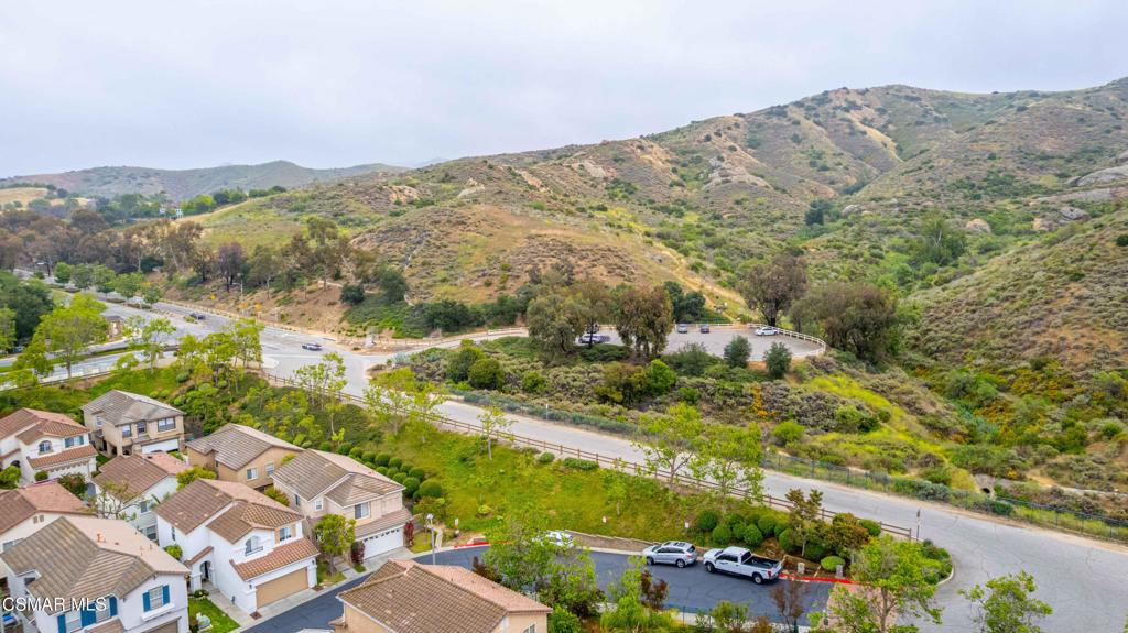 580 Fenwick Way, Unit C Simi Valley, CA 93065 - Photo 38 of 39 an aerial view of a house with a mountain