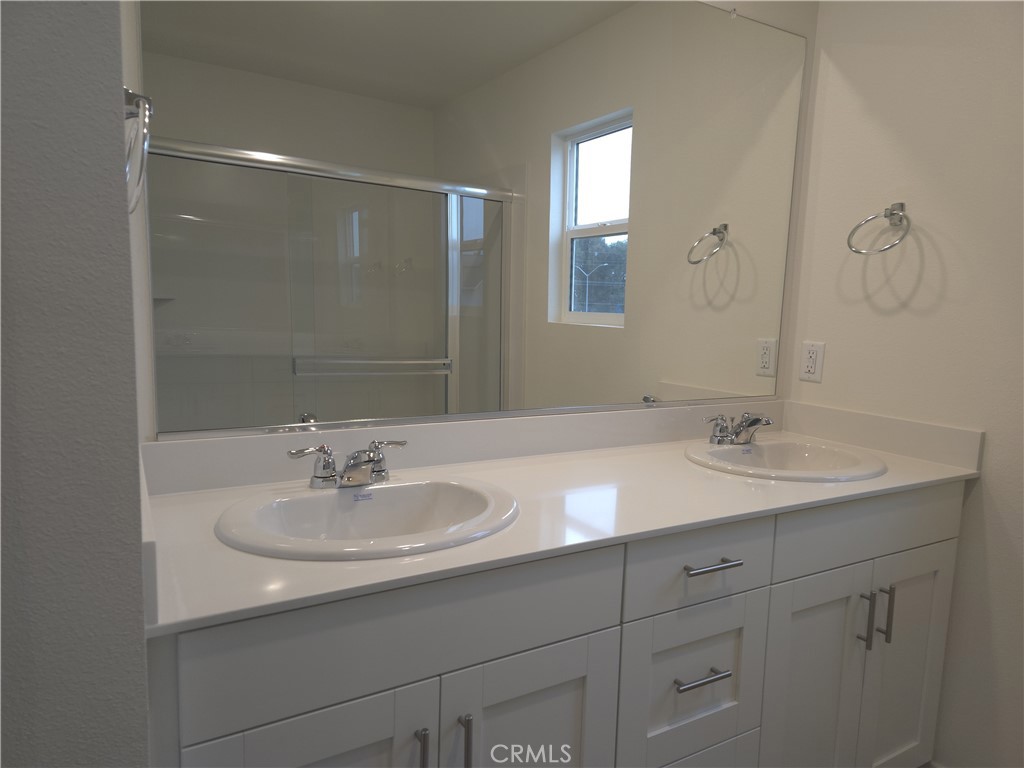 959 Pico Place Chico, CA 95973 - Photo 11 of 19 a bathroom with a sink and a mirror