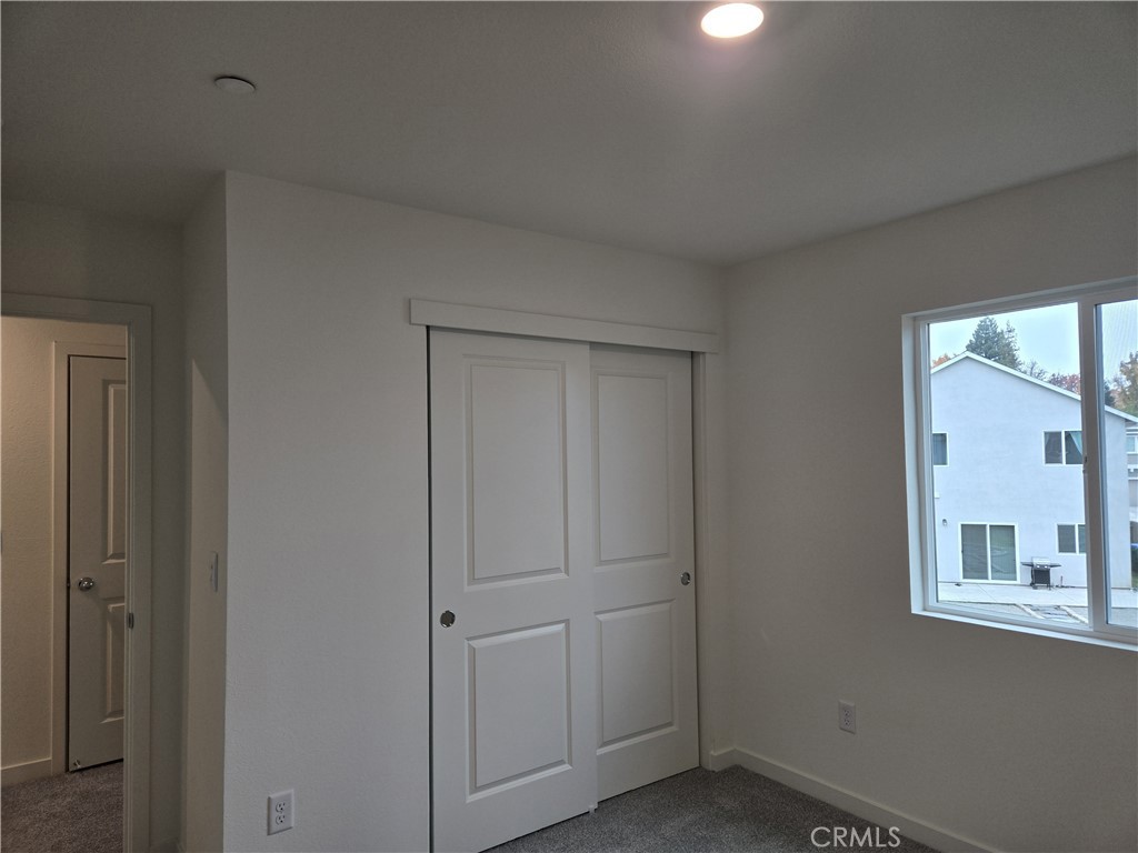 959 Pico Place Chico, CA 95973 - Photo 17 of 19 a view of an empty room with closet and a window