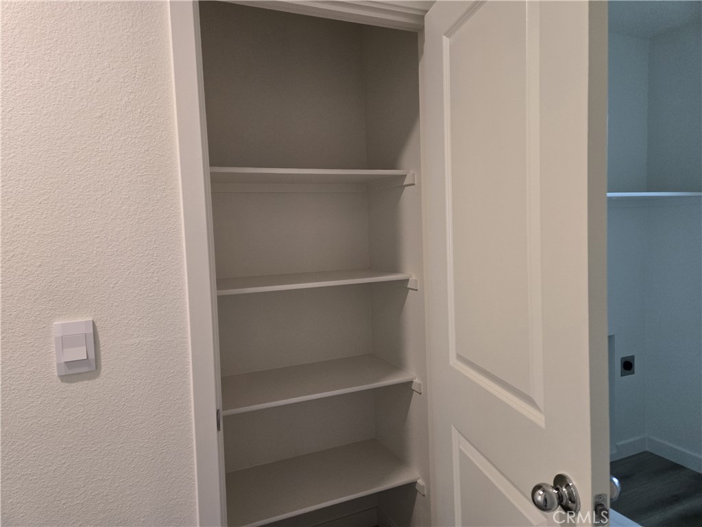 959 Pico Place Chico, CA 95973 - Photo 18 of 19 a view of walk in closet with empty racks
