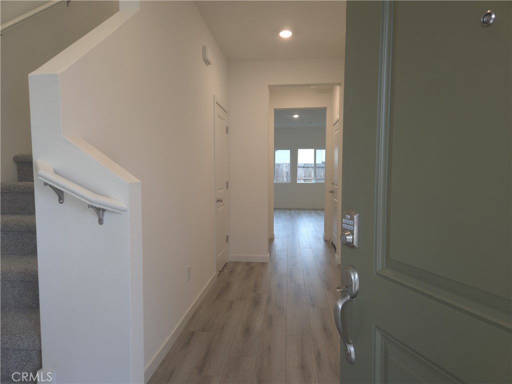 959 Pico Place Chico, CA 95973 - Photo 2 of 19 a view of empty room with wooden floor