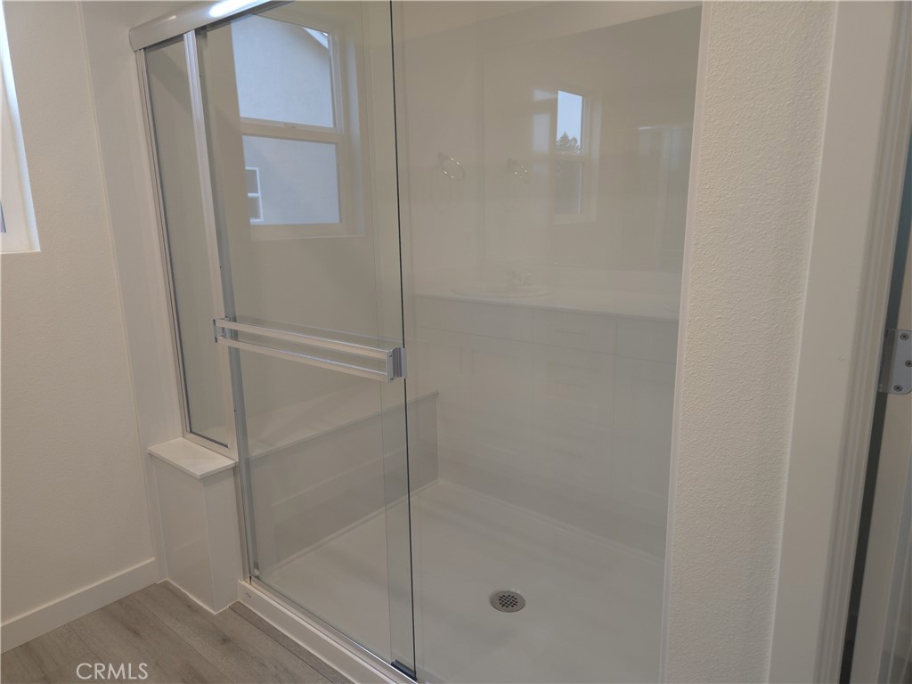 959 Pico Place Chico, CA 95973 - Photo 9 of 19 a bathroom with a glass shower door