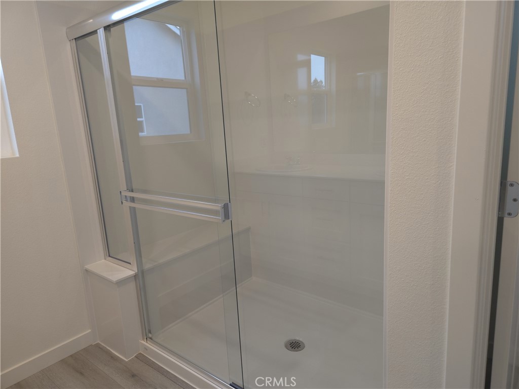 959 Pico Place Chico, CA 95973 - Photo 10 of 19 a bathroom with a glass shower door