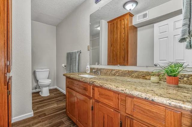 a outdoor living space with furniture and a fireplace