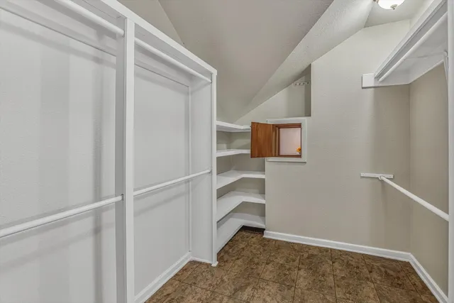 a view of a balcony with wooden floor and stairs