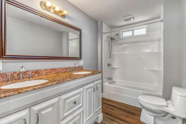 a view of a lake with a yard