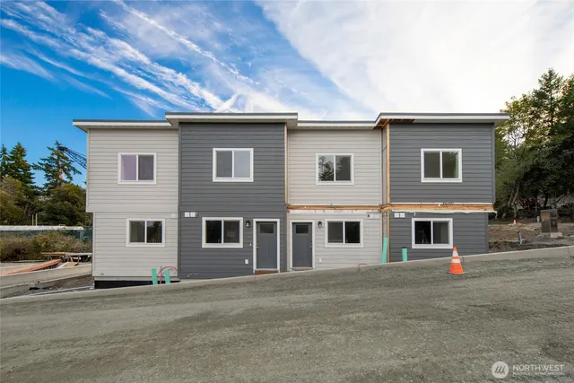 a view of a street with cars