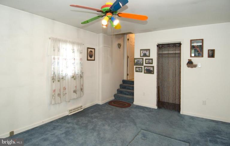508 Grovethorn Road Middle River, MD 21220 - Photo 12 of 19 wooden floor in an empty room with a window