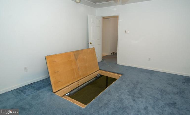508 Grovethorn Road Middle River, MD 21220 - Photo 16 of 19 an empty room with wooden floor