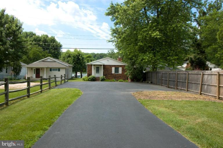 508 Grovethorn Road Middle River, MD 21220 - Photo 19 of 19 a front view of a house with a yard table and chairs