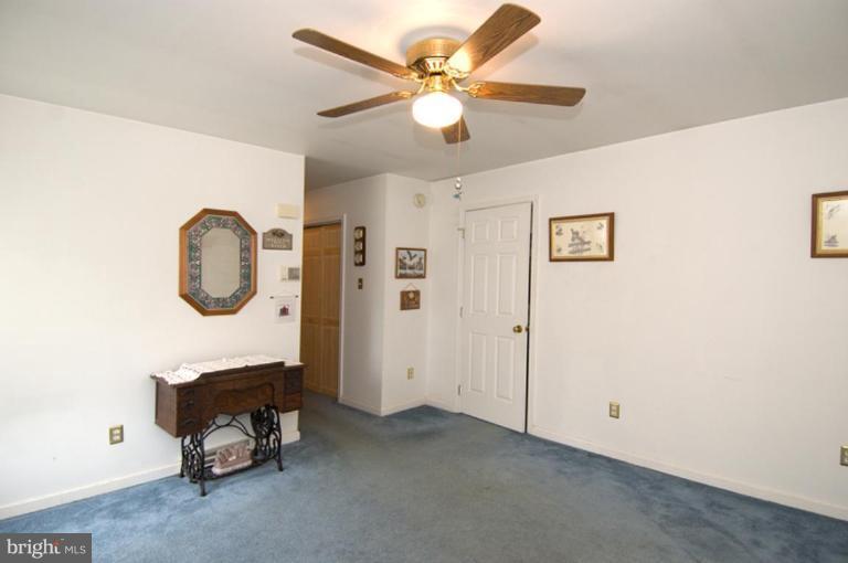 508 Grovethorn Road Middle River, MD 21220 - Photo 6 of 19 a living room with furniture and a table