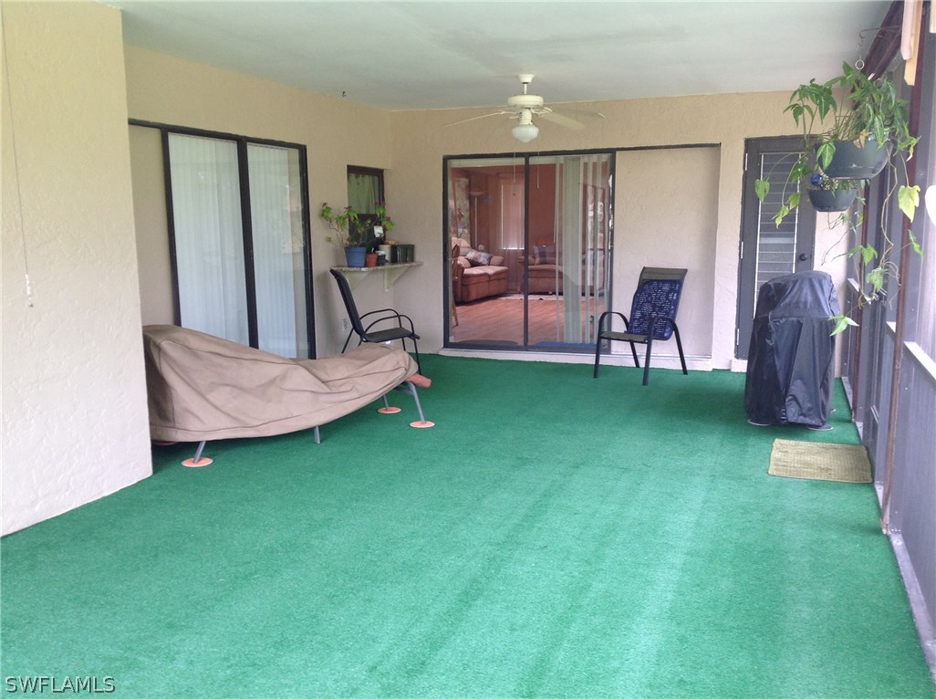 25 Michigan Road Lehigh Acres, FL 33936 - Photo 16 of 16 a bed room with a bed and a chair
