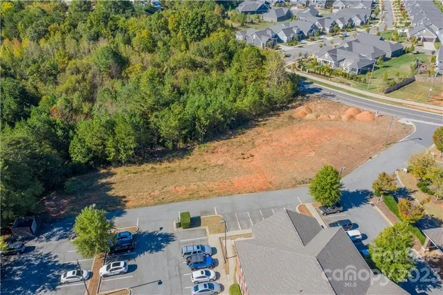 an aerial view of residential house with outdoor space