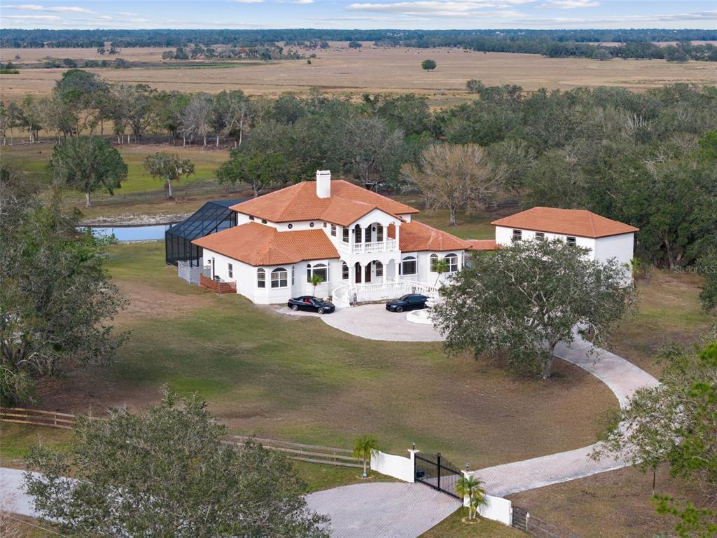 1450 Bern Creek Loop Sarasota, FL 34240 - Photo 3 of 95 an aerial view of a house