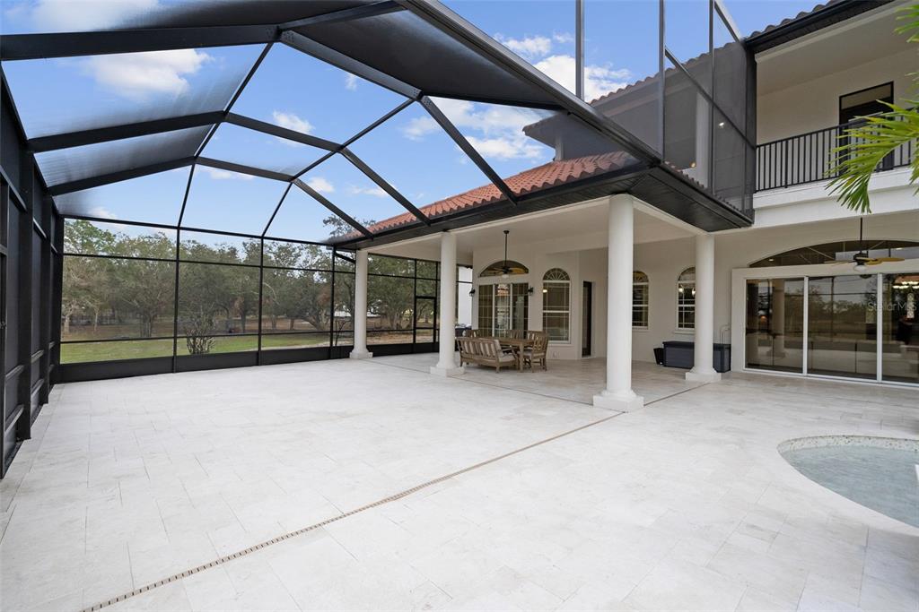 1450 Bern Creek Loop Sarasota, FL 34240 - Photo 32 of 95 a view of a house with porch and sitting area