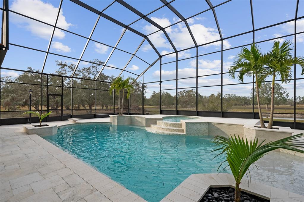 1450 Bern Creek Loop Sarasota, FL 34240 - Photo 36 of 95 a view of swimming pool with outdoor seating