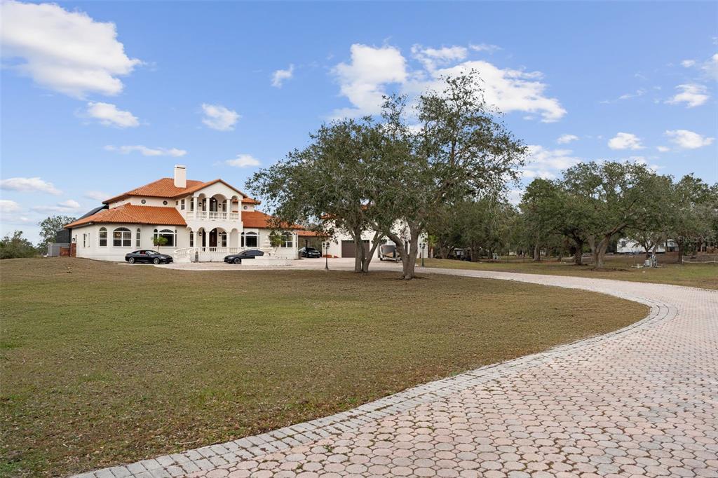 1450 Bern Creek Loop Sarasota, FL 34240 - Photo 4 of 95 a view of outdoor space yard and swimming pool
