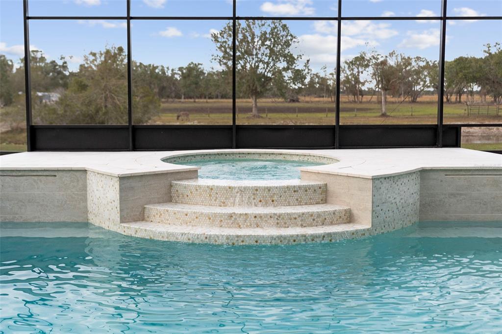 1450 Bern Creek Loop Sarasota, FL 34240 - Photo 42 of 95 a view of a floor to ceiling window with a yard