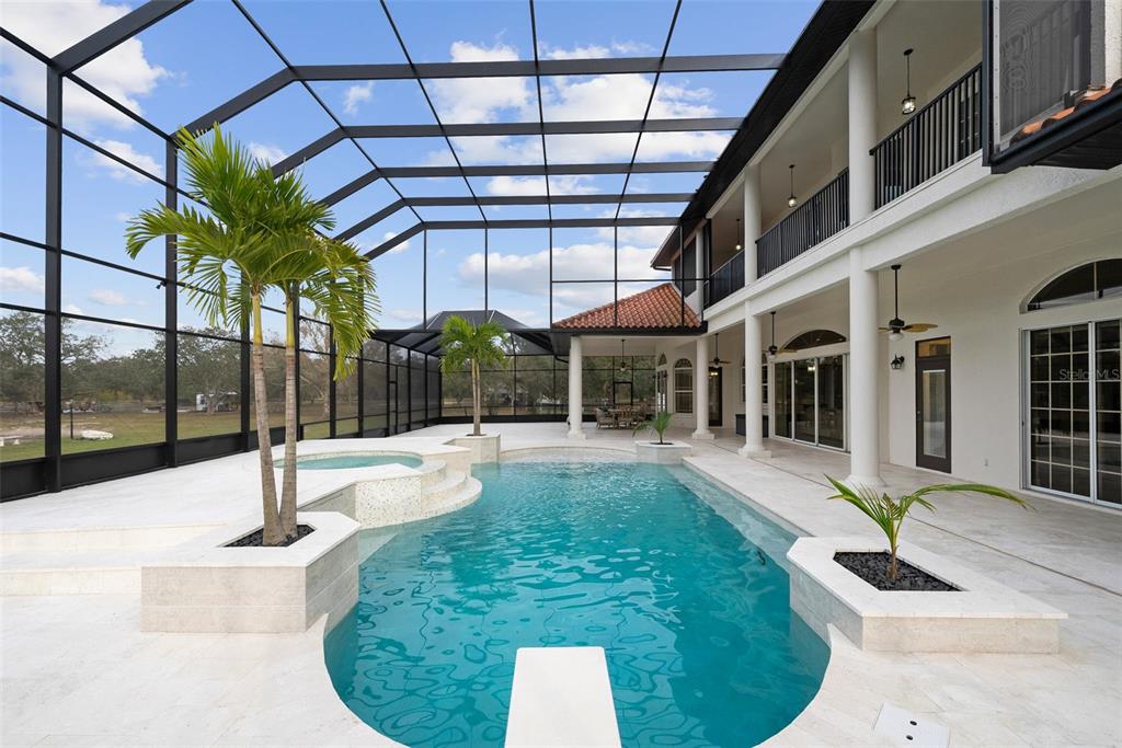 1450 Bern Creek Loop Sarasota, FL 34240 - Photo 47 of 95 a swimming pool with yard in front of it