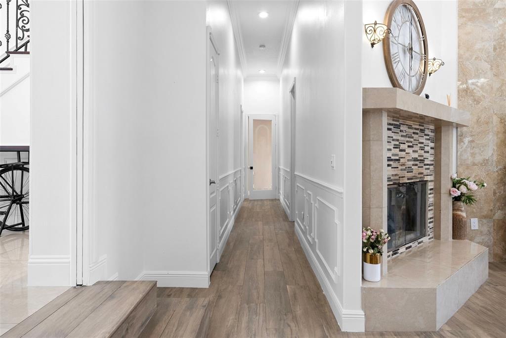 1450 Bern Creek Loop Sarasota, FL 34240 - Photo 53 of 95 a view of a hallway with wooden floor