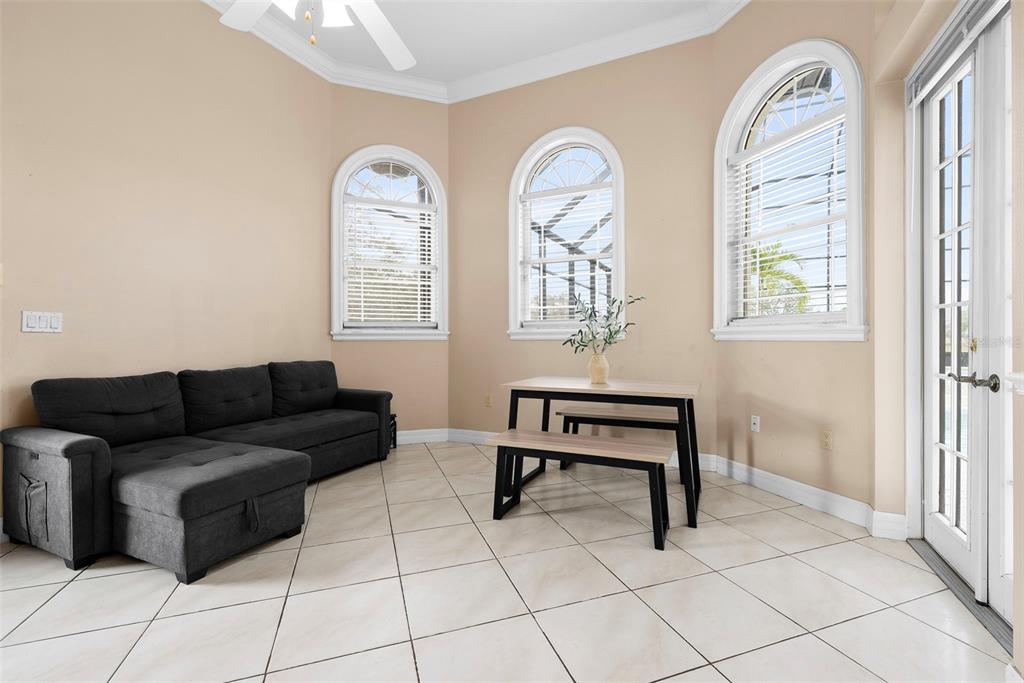 1450 Bern Creek Loop Sarasota, FL 34240 - Photo 58 of 95 a living room with furniture and a window