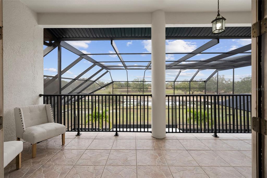 1450 Bern Creek Loop Sarasota, FL 34240 - Photo 77 of 95 a view of an empty room with a balcony
