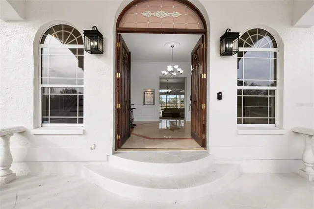 a bedroom with a bed and a table