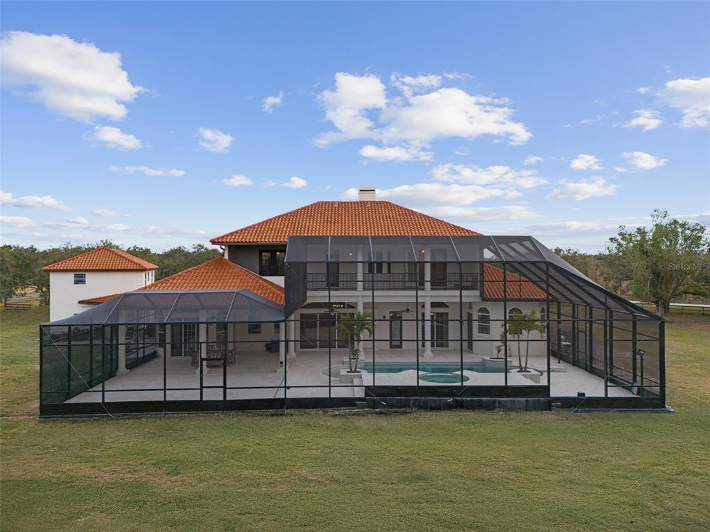 1450 Bern Creek Loop Sarasota, FL 34240 - Photo 93 of 95 a front view of a house with a ocean view