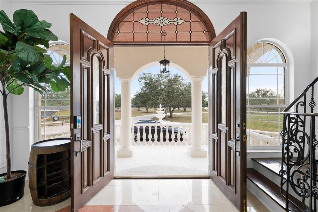 1450 Bern Creek Loop Sarasota, FL 34240 - Photo 10 of 95 a view of living room with a large window and outer view