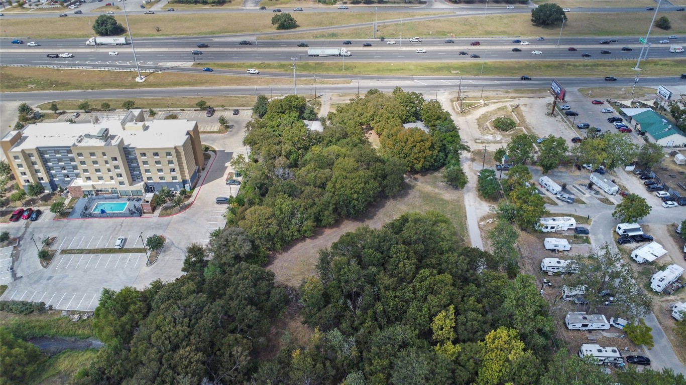 1322 North Interstate 35 San Marcos, TX 78666 - Photo 12 of 22 an aerial view of a house with a lake view
