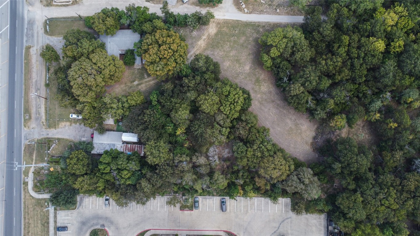 1322 North Interstate 35 San Marcos, TX 78666 - Photo 20 of 22 an aerial view of a house with a yard and garden