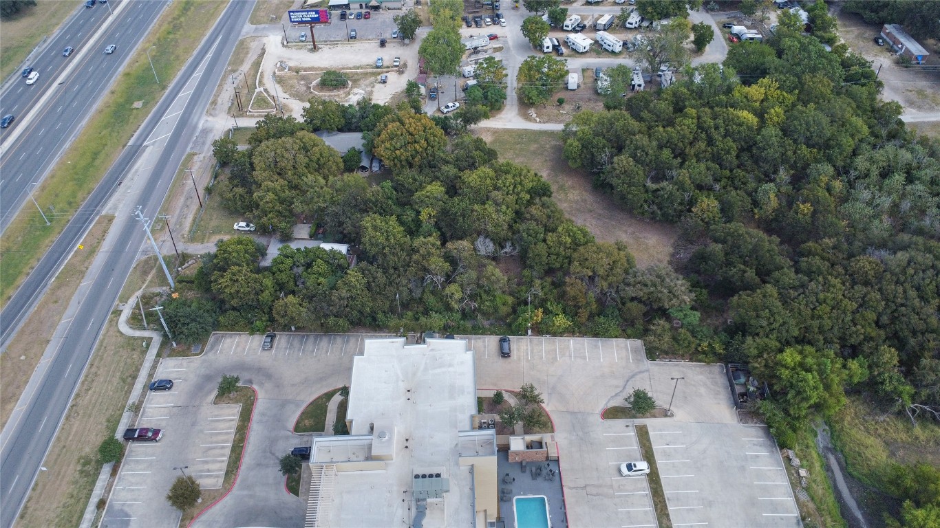 1322 North Interstate 35 San Marcos, TX 78666 - Photo 22 of 22 an aerial view of residential houses with outdoor space