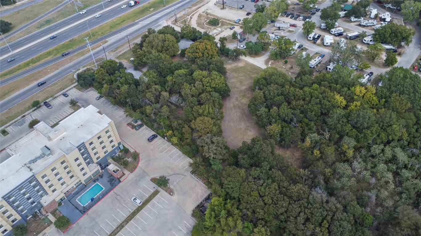 1322 North Interstate 35 San Marcos, TX 78666 - Photo 4 of 22 a view of a garden with a house