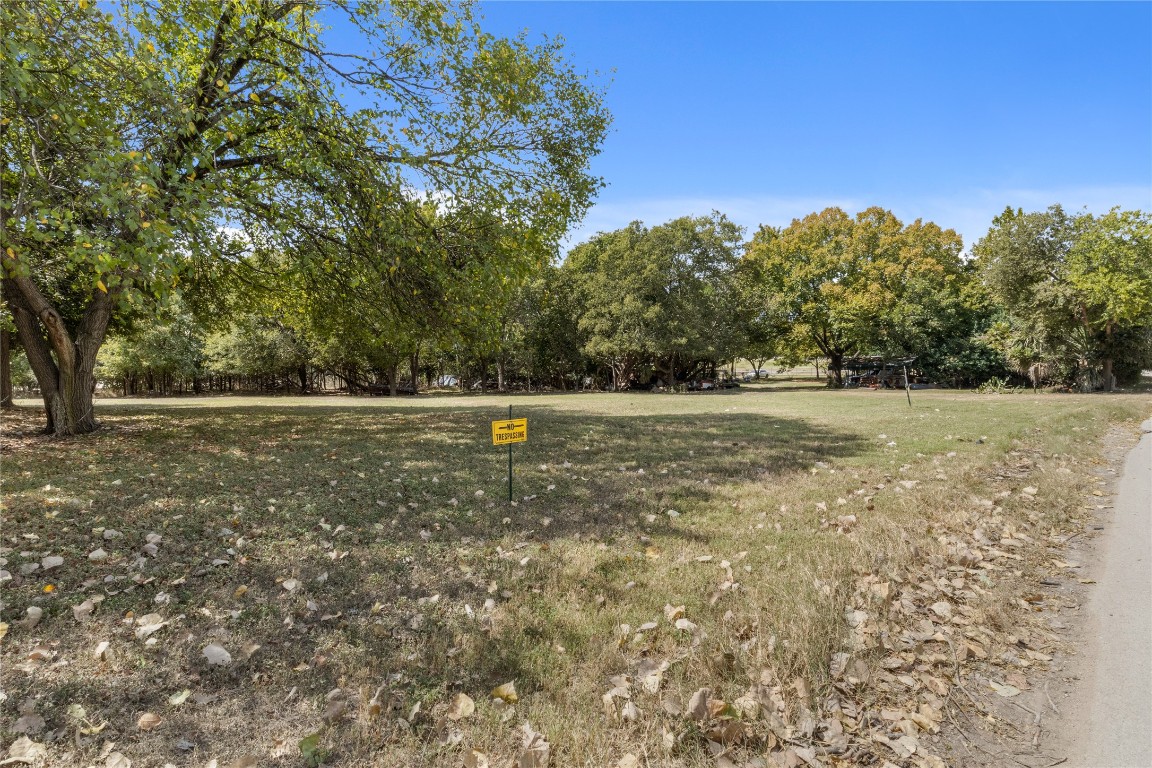 1322 North Interstate 35 San Marcos, TX 78666 - Photo 8 of 22 a backyard of a house with lots of green space