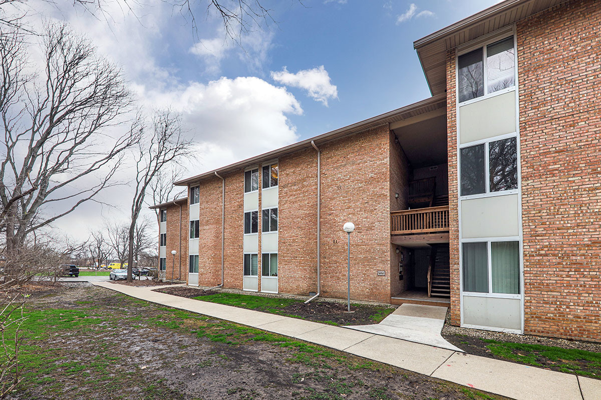 5852 Forest View Road, Unit E Lisle, IL 60532 - Photo 21 of 21 a brick building with a large windows