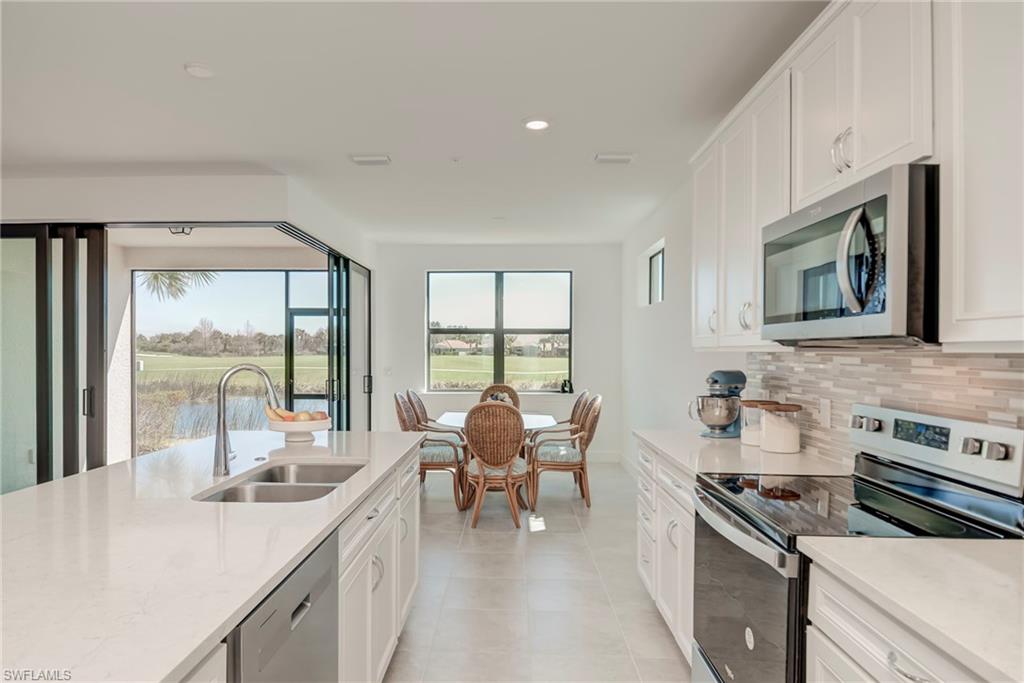 5686 Mayflower Way, Unit 702 Ave Maria, FL 34142 - Photo 15 of 50 WOW - What a view - While prepping and cooing your meal - enjoy the wildlife and awesome sunsets!