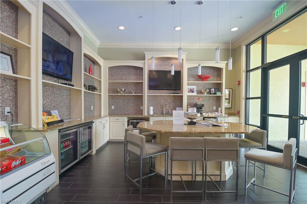 5686 Mayflower Way, Unit 702 Ave Maria, FL 34142 - Photo 44 of 50 Cafe in the Oasis where you can enjoy coffee & morning newspaper with neighbors