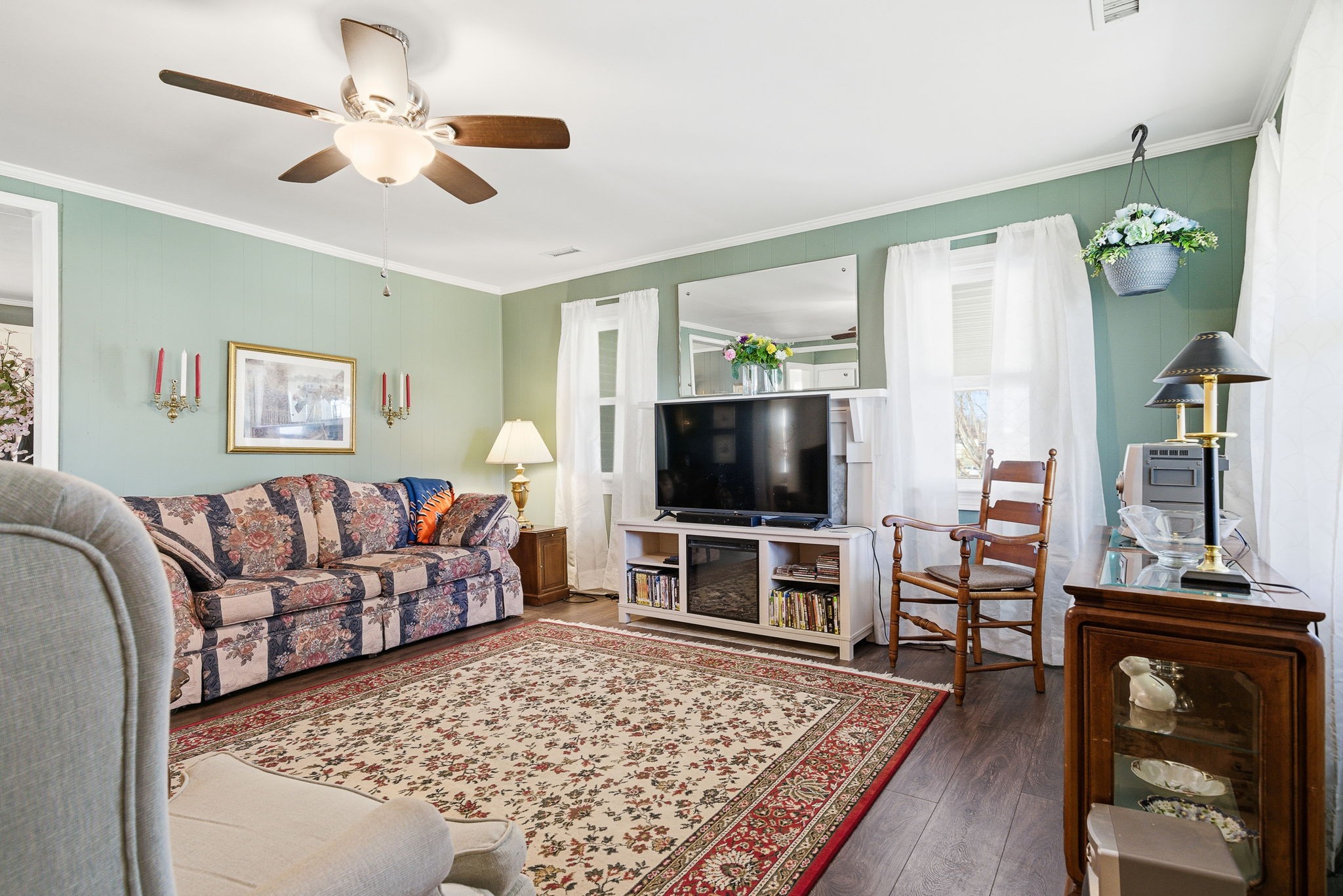143 Double Springs Road Cookeville, TN 38501 - Photo 4 of 38 a living room with furniture and a flat screen tv