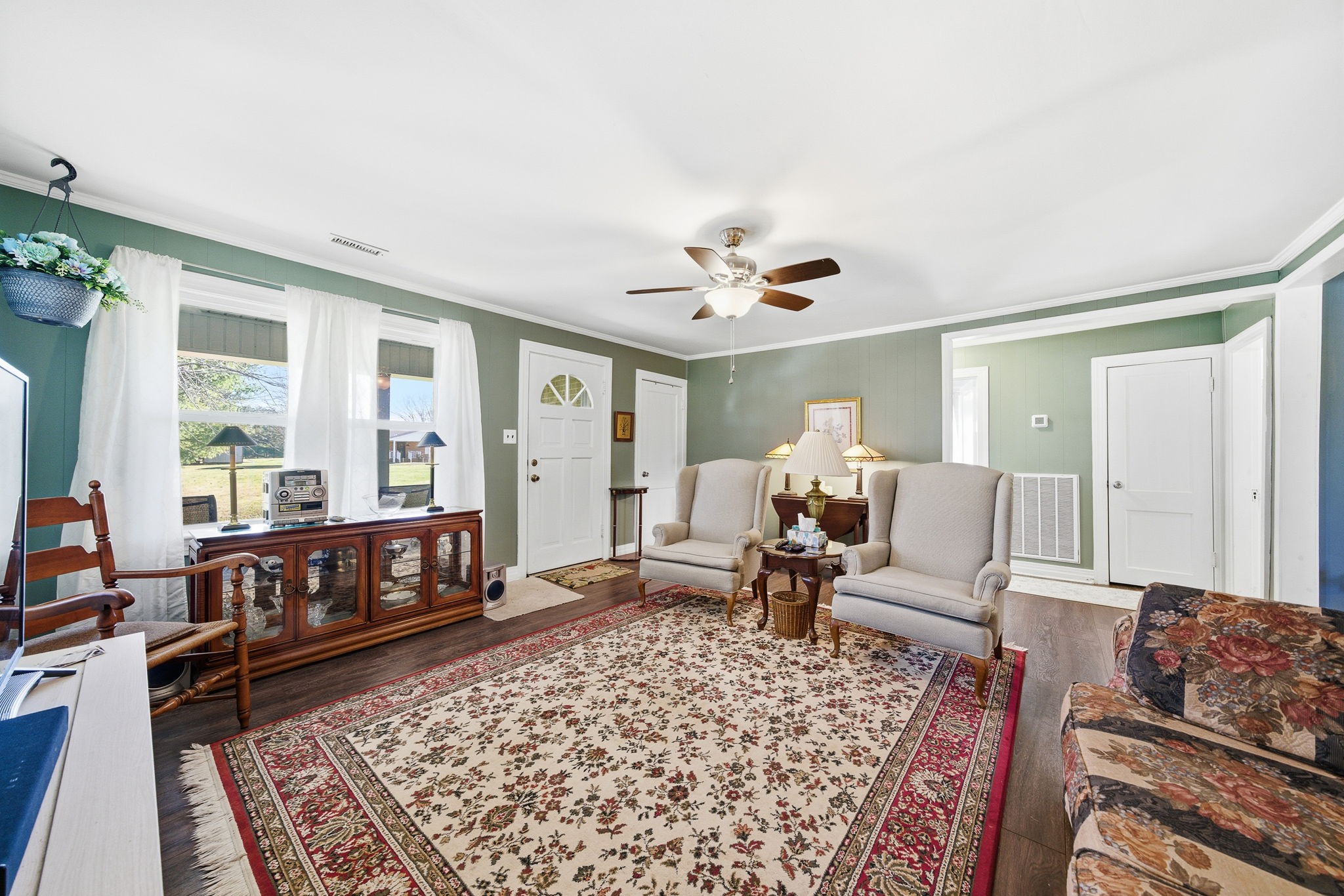 143 Double Springs Road Cookeville, TN 38501 - Photo 5 of 38 a living room with furniture and a rug
