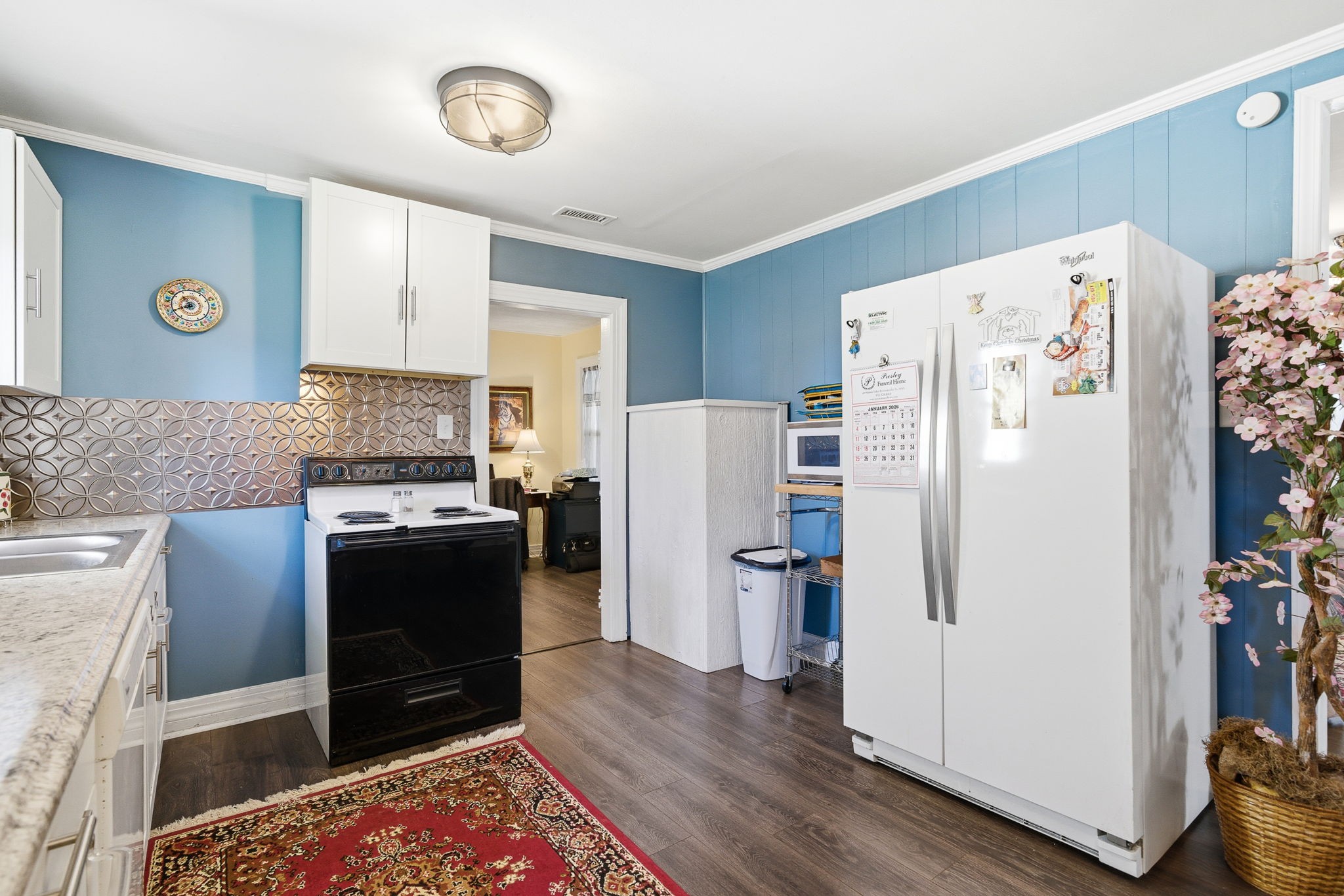 143 Double Springs Road Cookeville, TN 38501 - Photo 8 of 38 a kitchen with stainless steel appliances a refrigerator a stove and a refrigerator