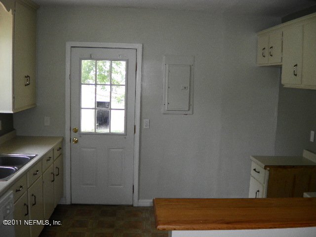 1785 Planters Road Jacksonville, FL 32207 - Photo 6 of 8 a room with storage and utility