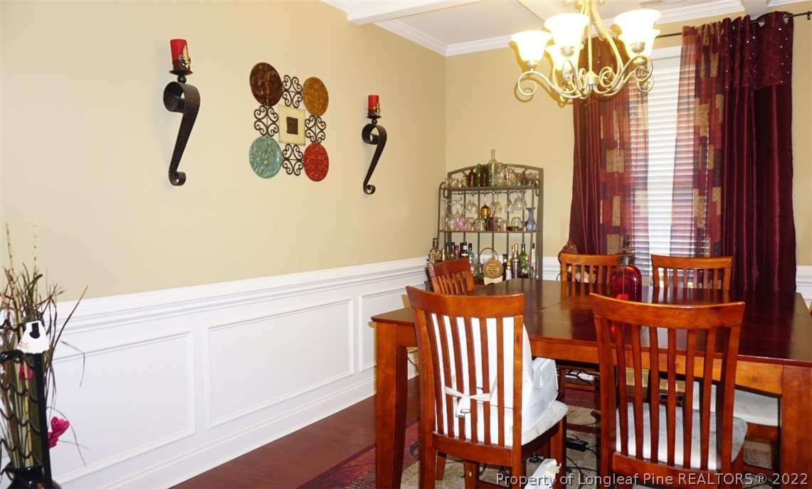 115 Shellbark Drive Spring Lake, NC 28390 - Photo 2 of 30 a view of a dining room with a table and chairs