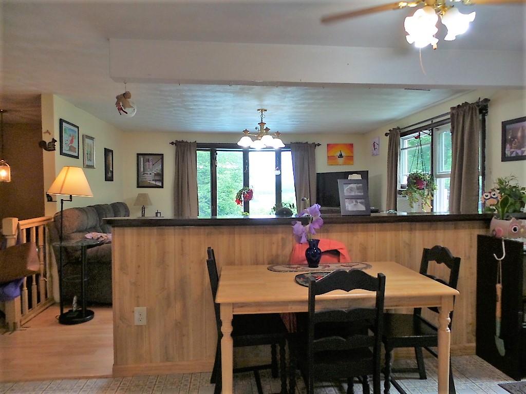 2221 West River Road Sidney, ME 04330 - Photo 5 of 21 Dining into Living Room