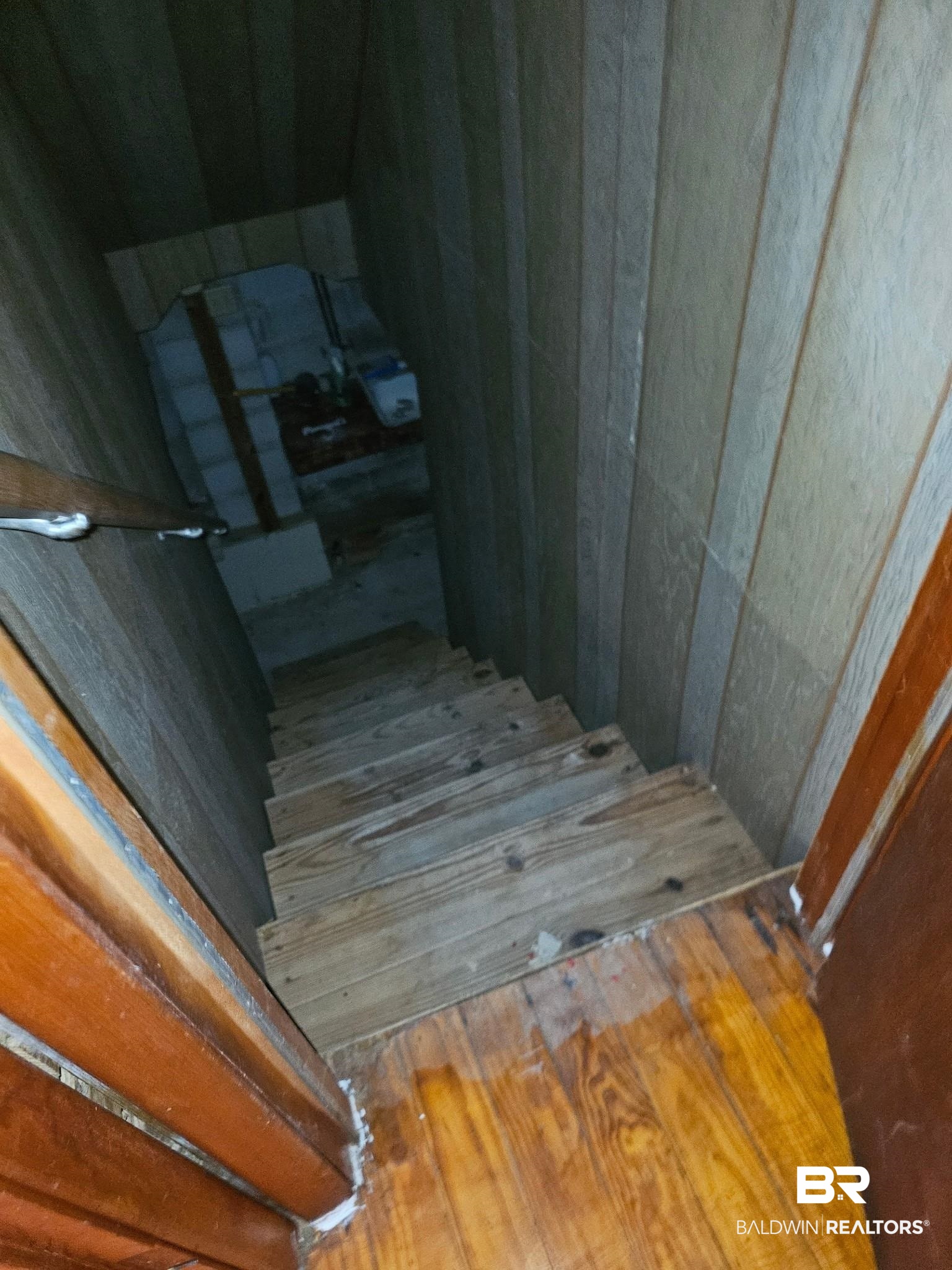 304 Sutherland Drive Mobile, AL 36611 - Photo 12 of 18 Stairs featuring wood-type flooring