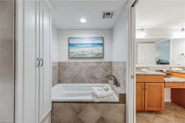 a living room with furniture fireplace and a window