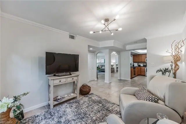 a bathroom with a granite countertop sink a toilet a mirror and shower